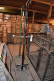 2Hanging cart on wheels, located building 6