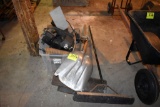 Assortment of shovels, broom, and light fixtures, located building 6