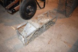 Small live trap, located building 6