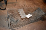 Large live trap, located building 6