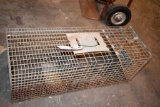 Large live trap, located building 6
