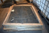 Assorted sizes of wooden framed wire panels, located building 6