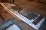 Assorted pile of tin, located building 6