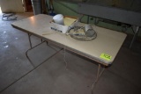 6 Folding table with contents, located building 7