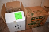 2 Boxes of glass fixture covers, located building 7