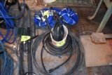 Assortment of new and used pressure washer hose, wands, located building 5