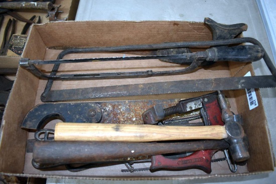 Assortment of Saws and Hammers