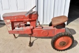 International 560 2 Hole Pedal Tractor with shifter missing parts, has had repairs