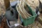 Garden hose, sprayer, watering can, cooler and whirly bird