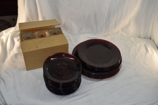 Assorted ruby red plates and 6 stemmed glasses