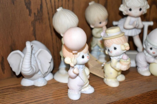9 Precious Moments Figurines