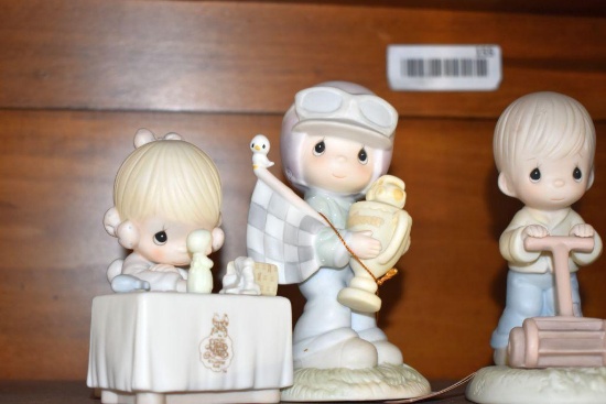 8 Precious Moments Figurines