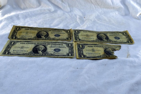 3 1935 One dollar silver certificates, one damaged silver certificate