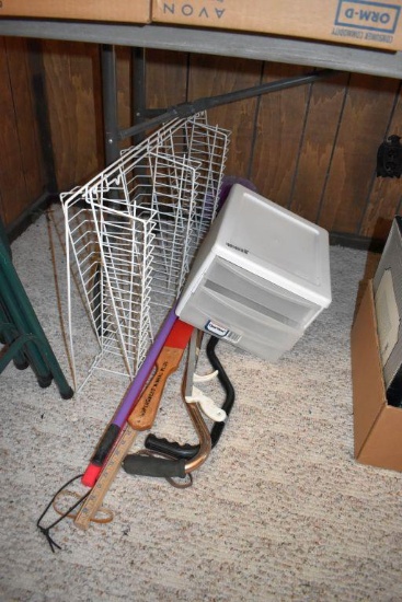 metal rack, canes, yard sticks, storage container