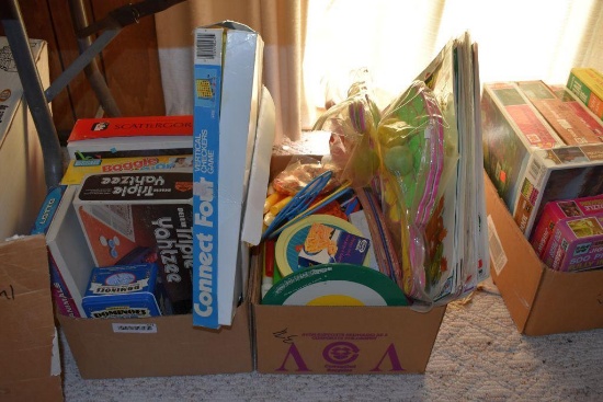 Three boxes of children's toys and games