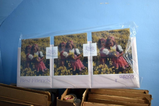 Large amount of Precious Moment displays and posters