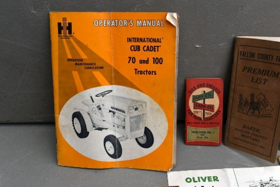 Farmers pocket ledger, IH cadet manual, Ford farming magazines, and other advertising