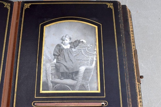 Old photo album with black and white photos