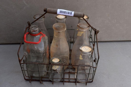 Metal milk case with assorted bottles
