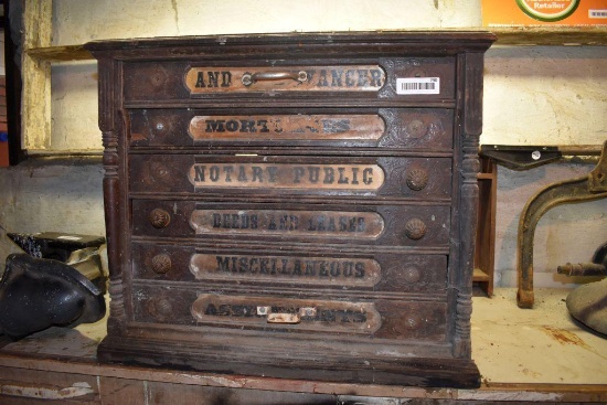 Spool Cabinet with water damage on bottom