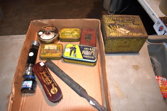 Assortment of advertising tins