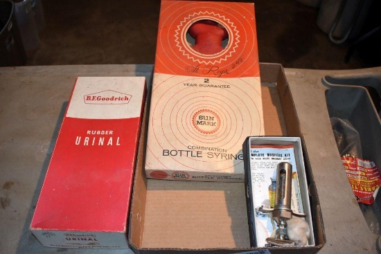 BF Goodrich rubber urinal in original box, hot water bottle