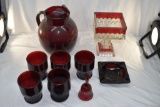 Ruby Red water pitcher and glasses, ashtray, bell