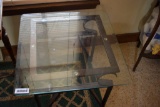 Metal framed glass top table