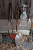 Assortment of rakes and shovels