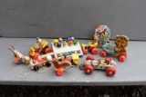 Large Assortment of Fisher Price pull toys