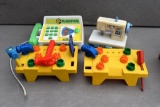 Children's sewing machine, Little Tikes tool sets, and talking phone