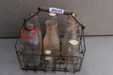 Metal milk case with assorted bottles