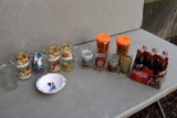 Assortment of Kentucky glasses, Garfield cups and other glasses