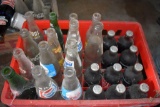 Plastic bottle case with assorted bottles
