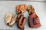 Assortment of vintage baseball gloves
