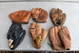 Assortment of vintage baseball gloves