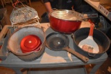 Assortment of cast iron pans, cake keeper