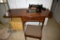 Singer sewing machine model AJ288212 with cabinet and stool