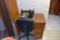 Singer sewing machine model AG553449 with cabinet and chair