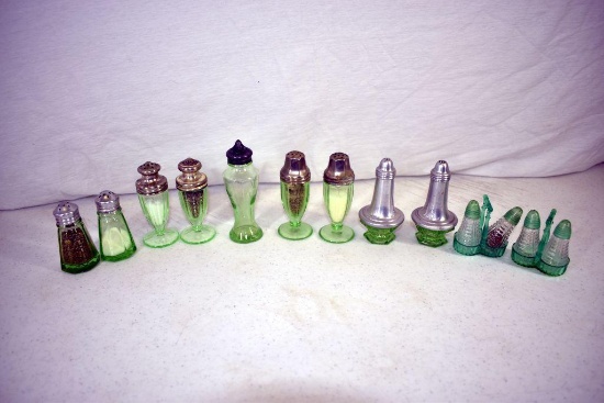 Assortment of green depression salt and peppers