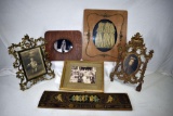Assortment of wooden and metal picture frames