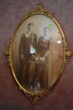 Oval glass picture frame and photo