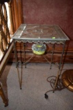 Glass top metal framed table