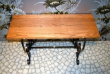 Wooden bench with metal base