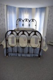 Rod iron double bed
