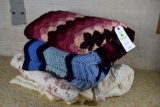 Assortment of blanket and afghans