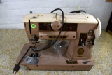 Singer Model 401A table top sewing machine with foot control
