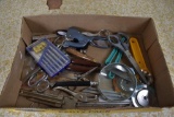 Assortment of sewing tools, scissors, cutters