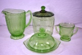 Green depression water pitcher, biscuit jar, covered butter dish