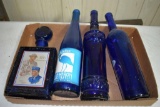 Assortment of decorative blue bottles